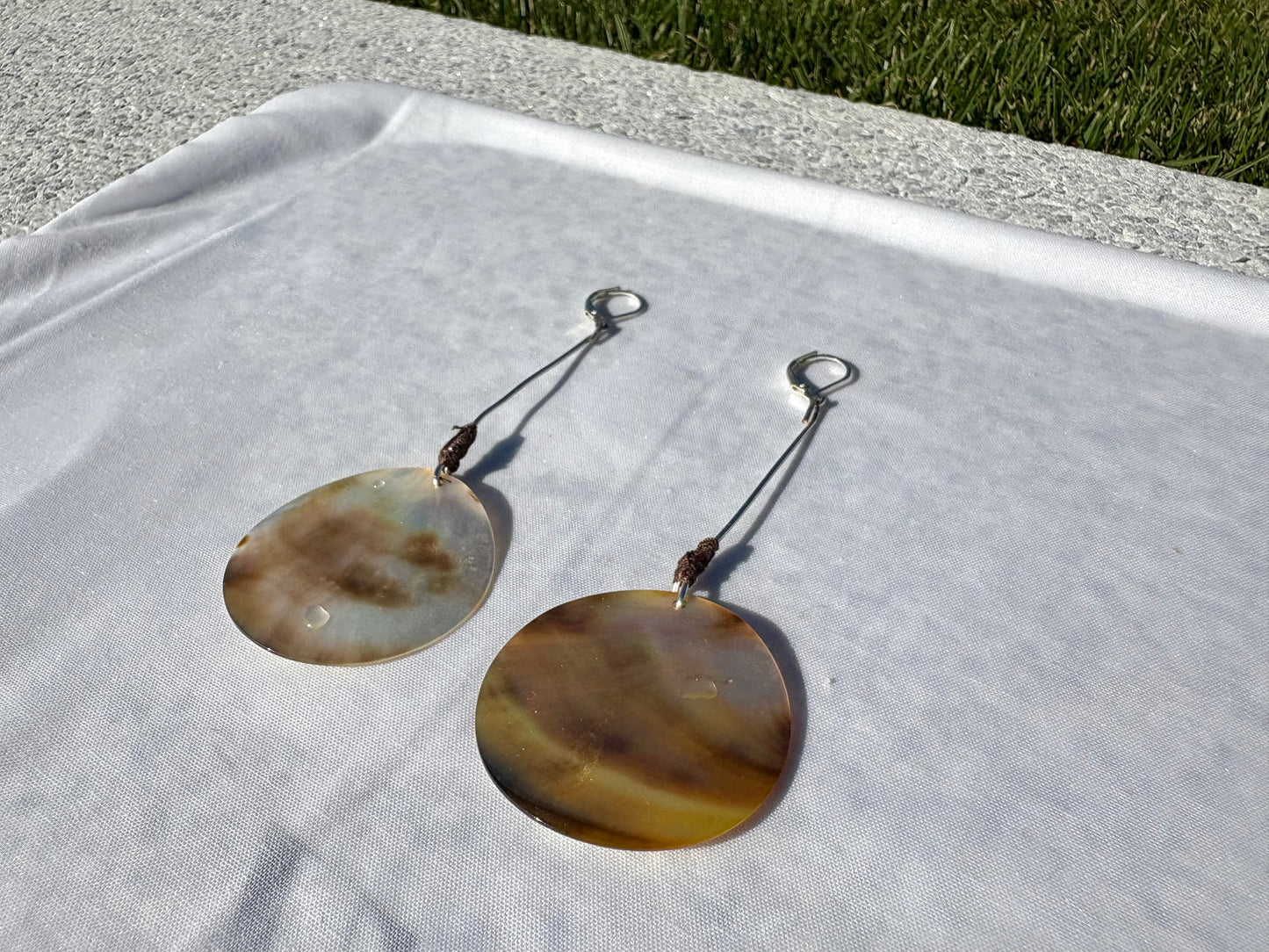 “Gory bond” earrings.