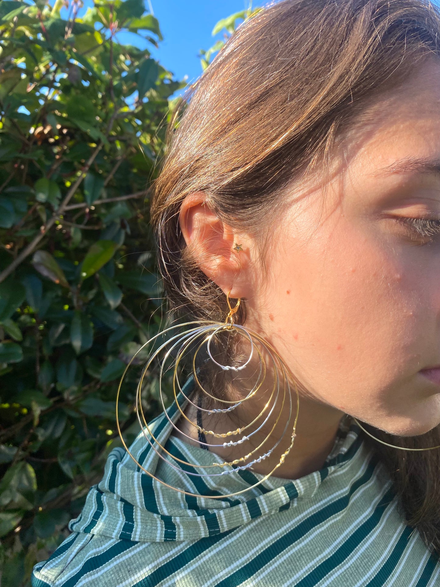 “Rising ego” earrings.