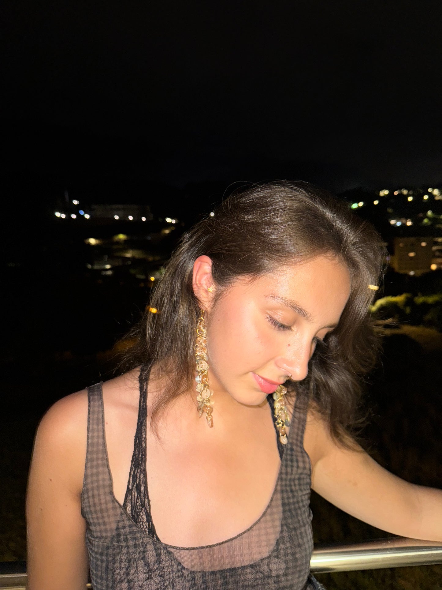 “Profane ground” earrings.