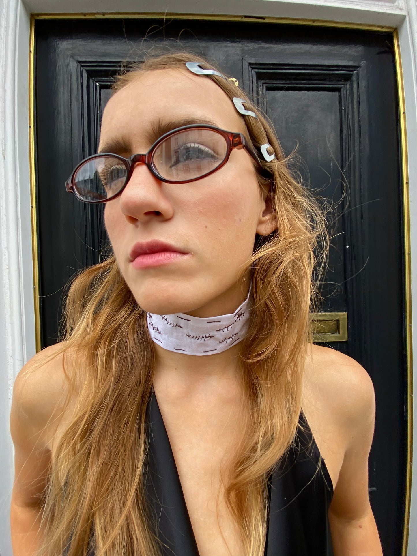 “Folie a deux” choker.