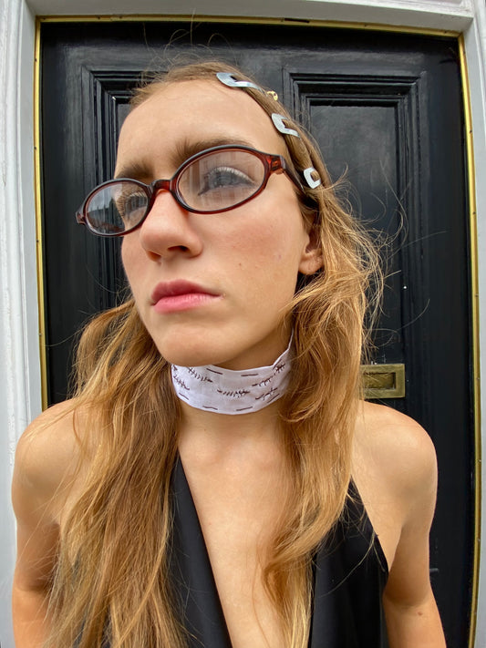 “Folie a deux” choker.