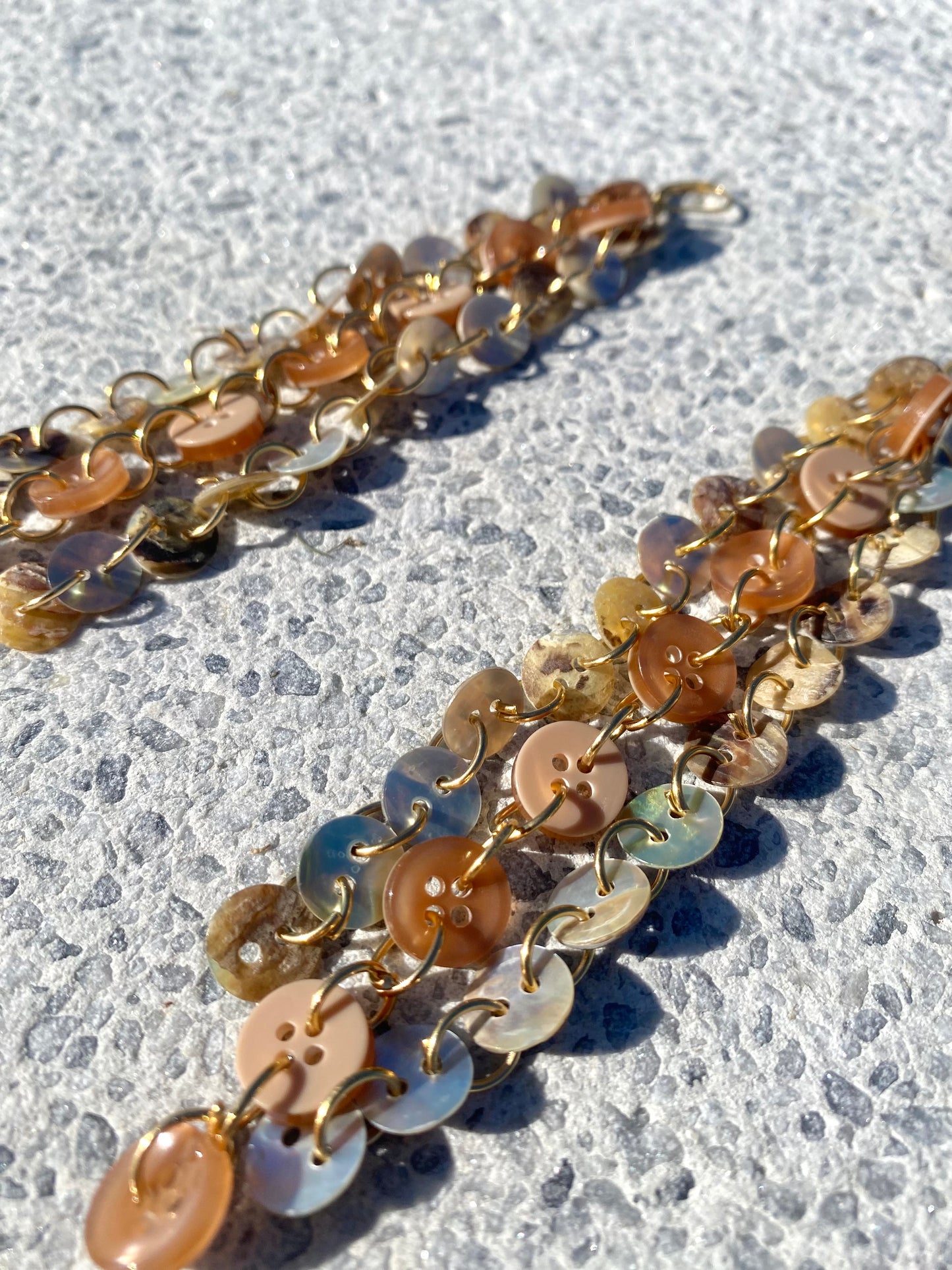 “Profane ground” earrings.