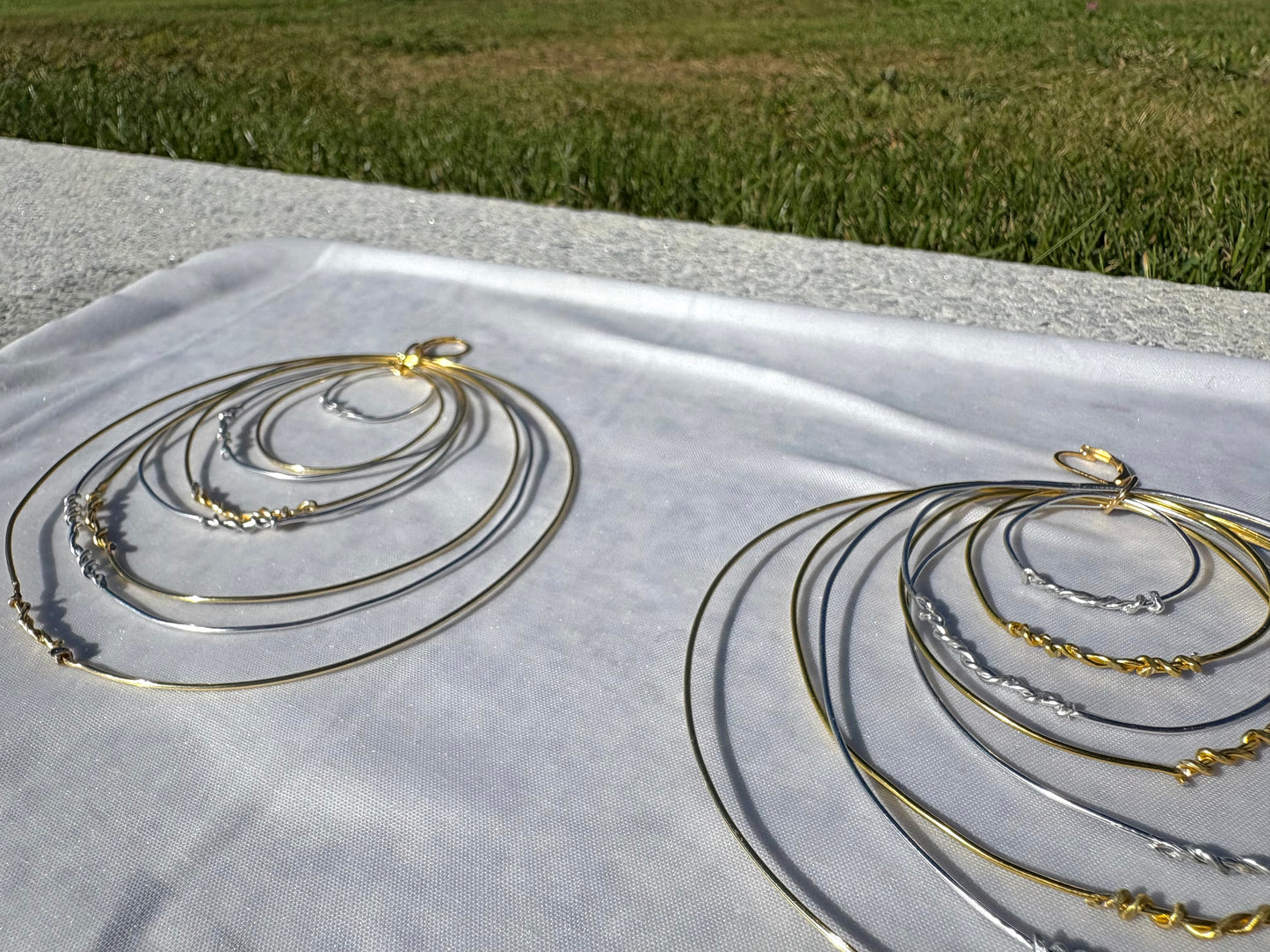 “Rising ego” earrings.