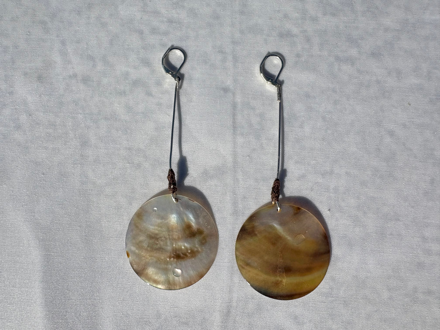 “Gory bond” earrings.